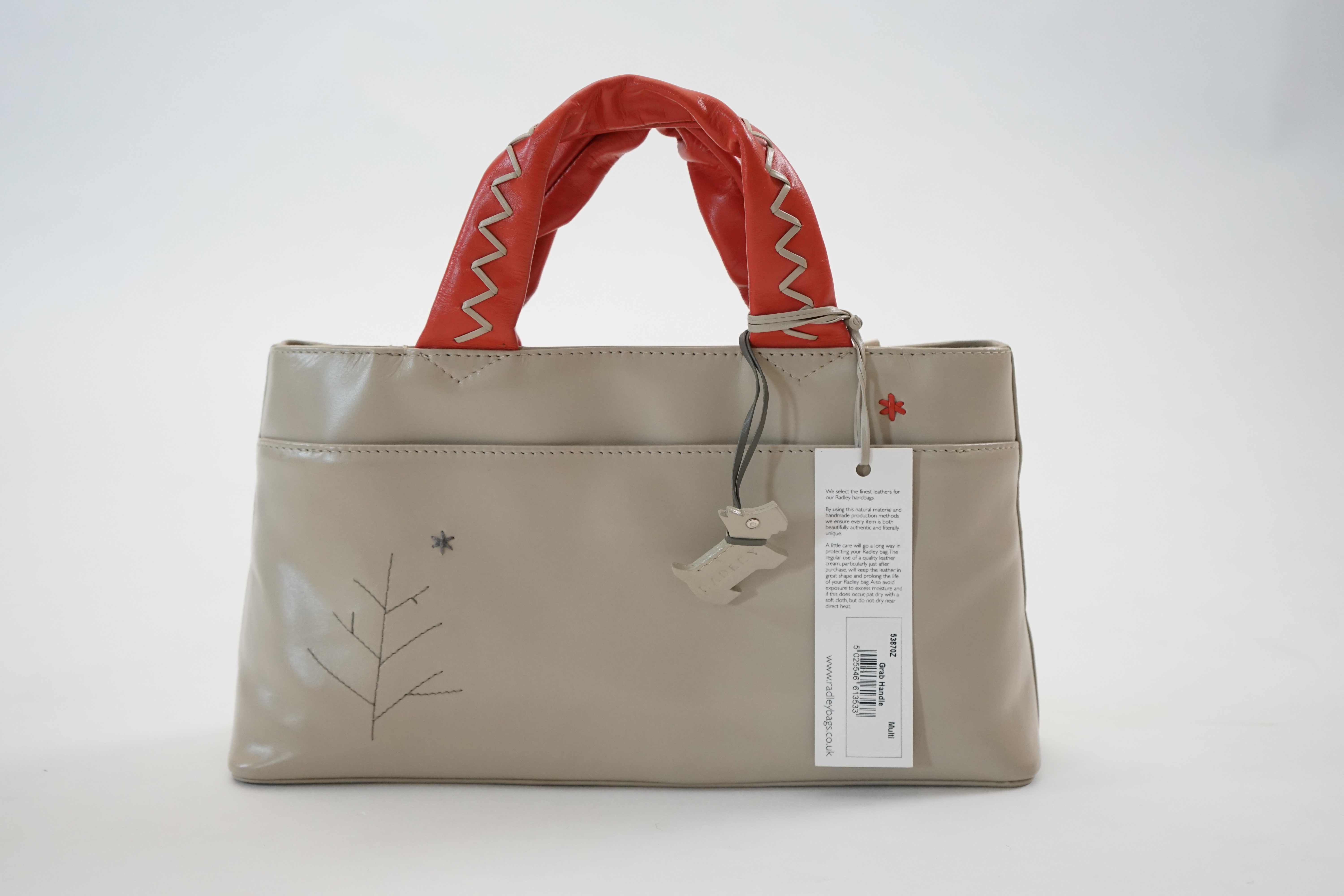 A Radley 'Seasons Greeting Reindeer Christmas' leather grab handle bag 2005, width 30cm, depth 8cm, height 16cm